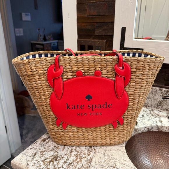 kate spade Handbags - Kate Spade Natural Straw Tote with Red Crab Design